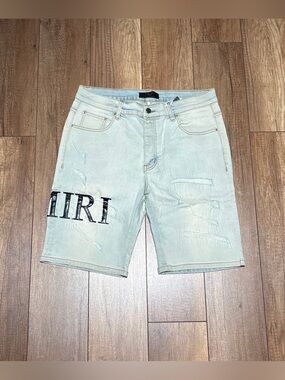 Amiri Mens Light Blue Distressed Ripped Jean Shorts with Black Logo Brand New